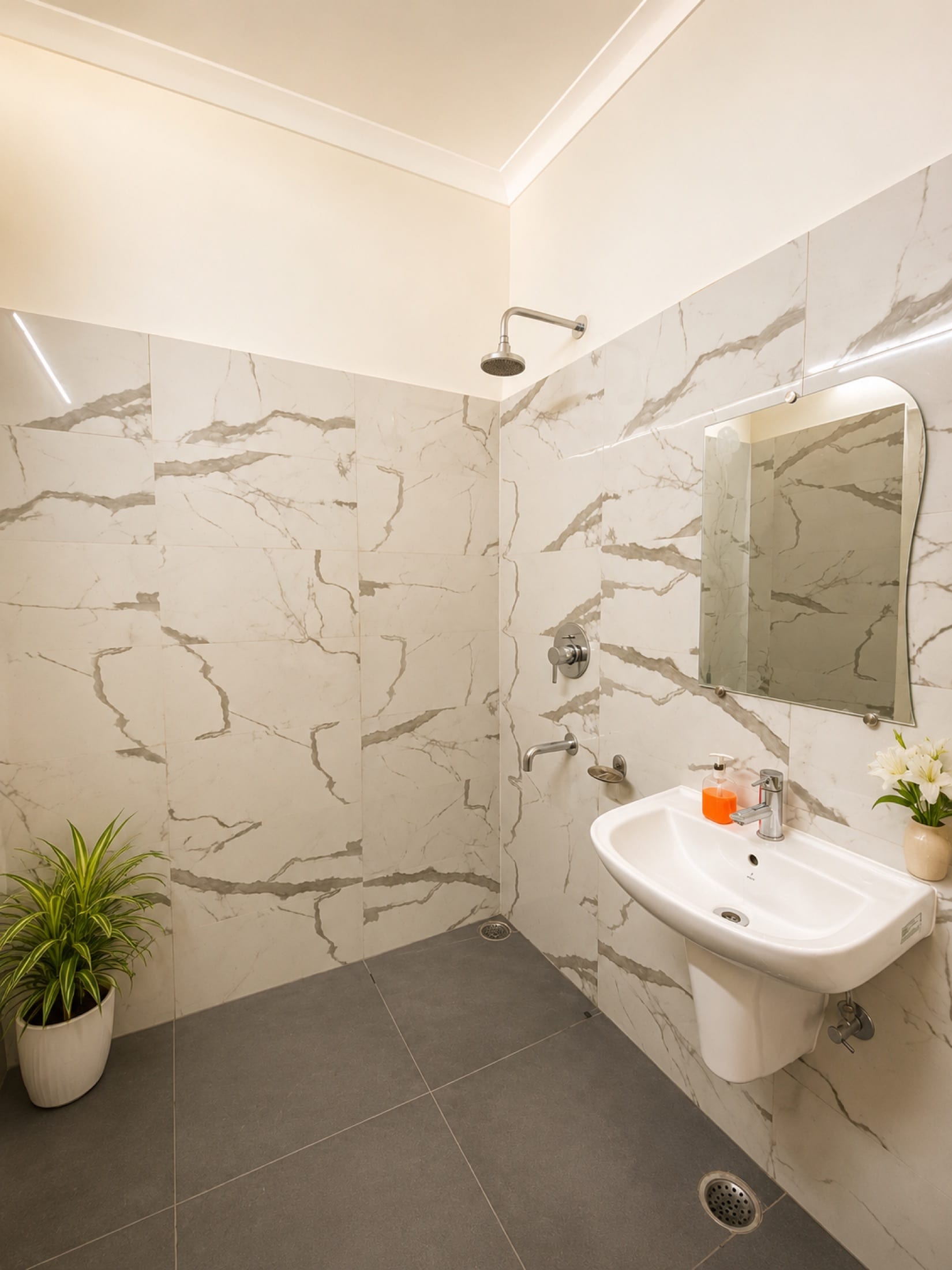 Deluxe Room washroom at Hotel Vasant