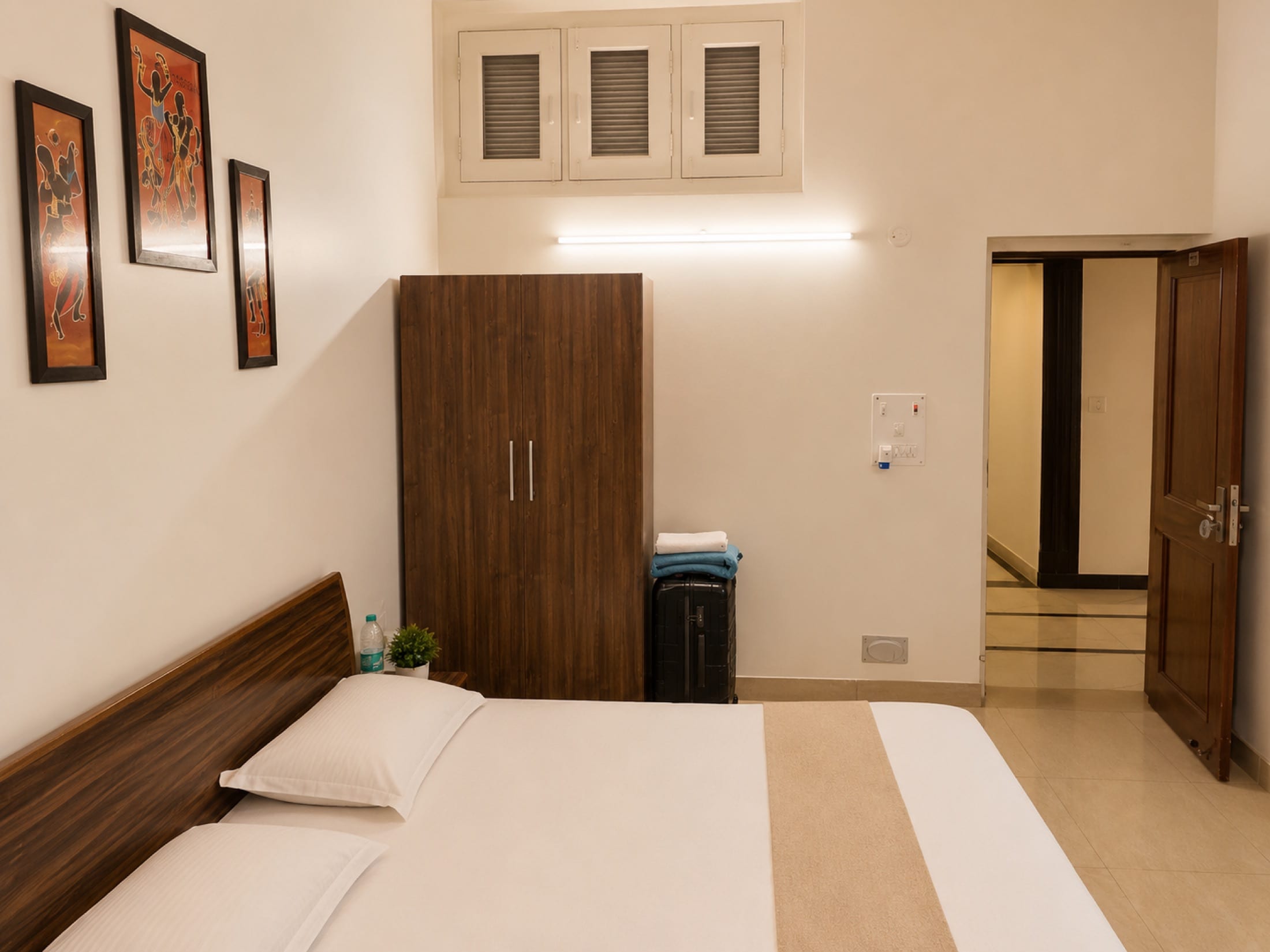 Deluxe Room at Hotel Vasant with comfortable bedding